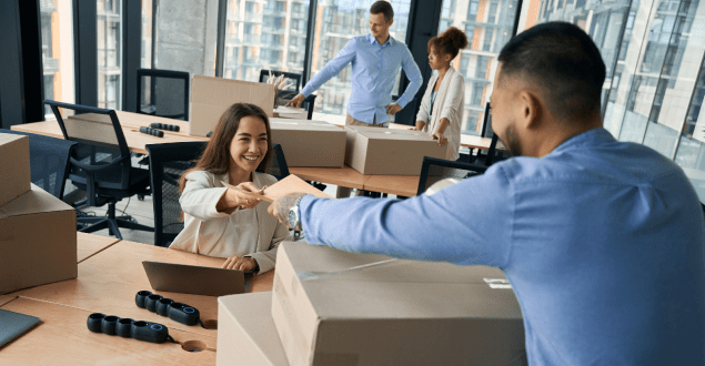 group-of-corporate-employees-involved-in-office-move group of corporate employees involved in office move