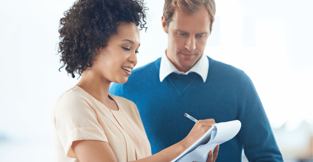 young-couple-filling-out-checklist young couple filling out checklist