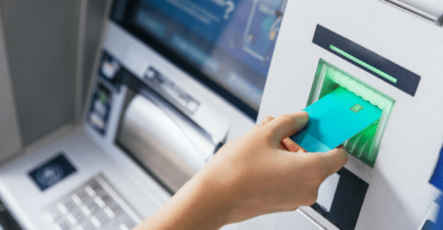close-up-of-a-girl-inserting-a-credit-card-in-atm
Close up of a girl inserting a credit card in ATM bank machine to transfer money or withdraw